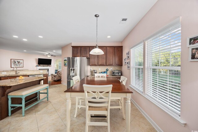 1112 Raven Cliff Ct, Conway, SC 29526 - dining room with light tile patterned flooring, a ceiling fan, recessed lighting, and baseboards
