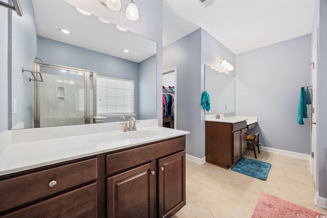 1112 Raven Cliff Ct, Conway, SC 29526 - bathroom with a shower stall, two vanities, tile patterned flooring, and baseboards
