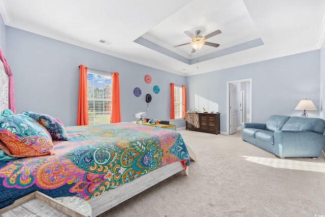 1112 Raven Cliff Ct, Conway, SC 29526 - bedroom with crown molding, carpet flooring, a tray ceiling, and ceiling fan