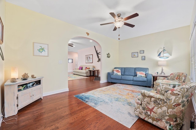 1112 Raven Cliff Ct, Conway, SC 29526 - living area featuring ceiling fan, arched walkways, dark wood-style flooring, and baseboards