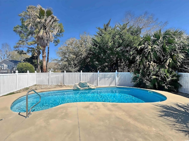 613 23rd Ave N, North Myrtle Beach, SC 29582 - view of pool with a fenced backyard and a patio area