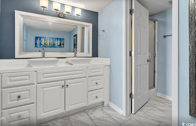 707 S Ocean Blvd Unit 602, North Myrtle Beach, SC 29582 - full bathroom featuring marble look tile flooring, vanity, an enclosed shower, and baseboards
