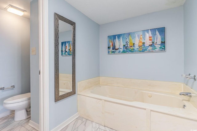 707 S Ocean Blvd Unit 602, North Myrtle Beach, SC 29582 - full bathroom with marble look tiles, a bath, toilet, and baseboards