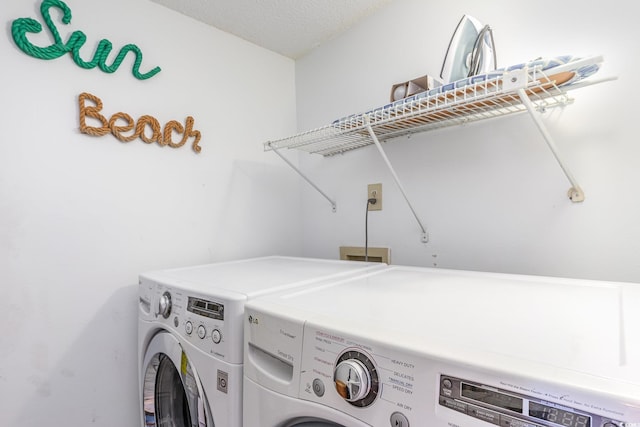 707 S Ocean Blvd Unit 602, North Myrtle Beach, SC 29582 - laundry room with washing machine and clothes dryer