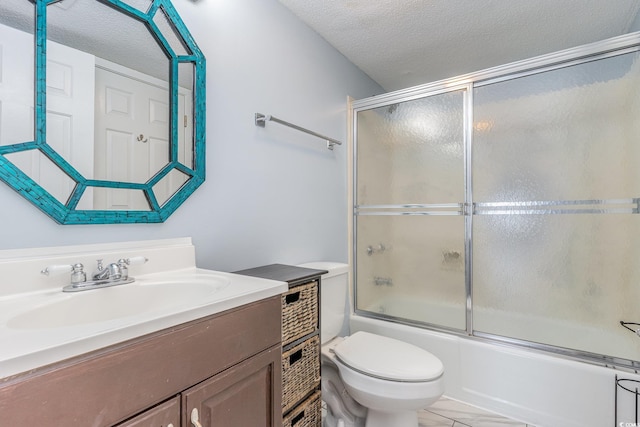 707 S Ocean Blvd Unit 602, North Myrtle Beach, SC 29582 - full bathroom featuring toilet, a textured ceiling, vanity, and shower / bath combination with glass door