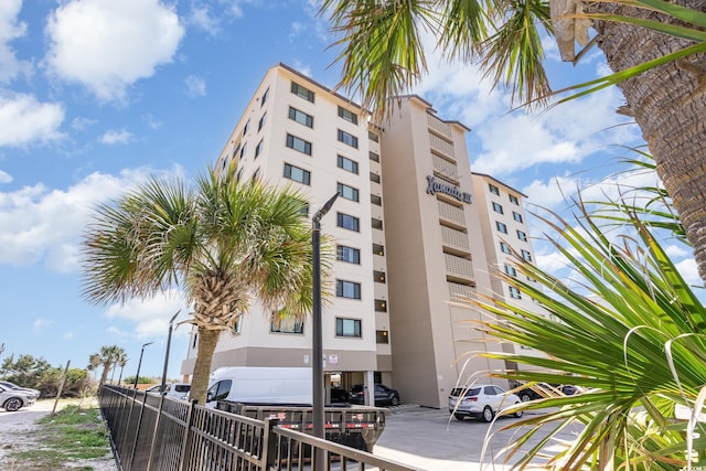 707 S Ocean Blvd Unit 602, North Myrtle Beach, SC 29582 - view of apartment building / complex featuring uncovered parking