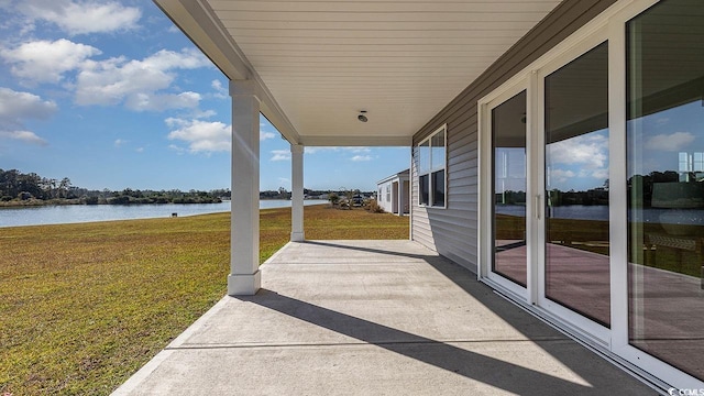 view of patio / terrace with a water view