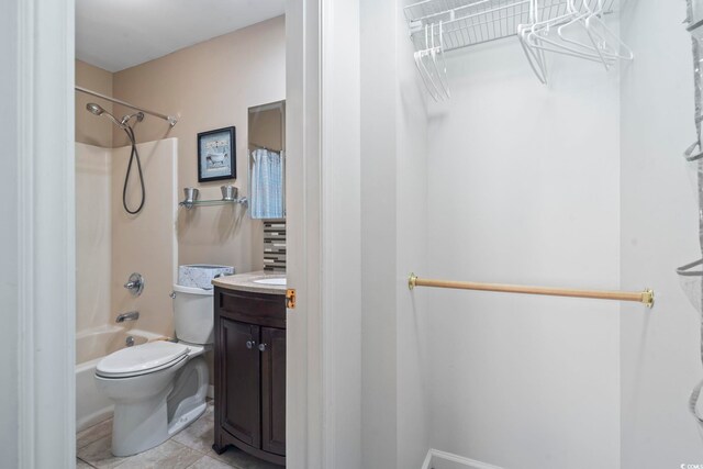 1425 N Waccamaw Dr Unit 123, Garden City Beach, SC 29576 - bathroom featuring vanity, tub / shower combination, toilet, and tile patterned flooring