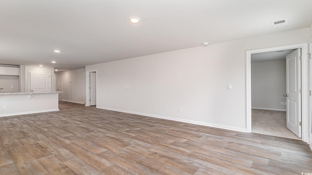 1458 Nokota Dr, Conway, SC 29526 - unfurnished living room featuring light wood-type flooring and recessed lighting