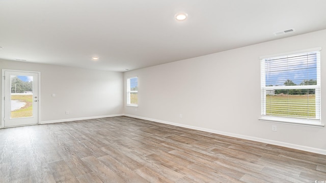 1458 Nokota Dr, Conway, SC 29526 - empty room featuring light wood-style flooring and recessed lighting