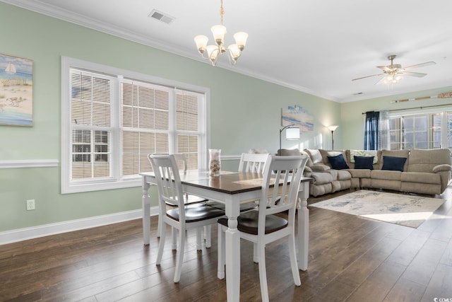 4141 Hibiscus Dr Unit 201, Little River, SC 29566 - dining room featuring ornamental molding, dark wood-style floors, a chandelier, baseboards, and a ceiling fan