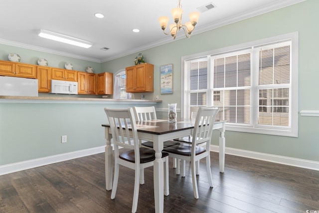4141 Hibiscus Dr Unit 201, Little River, SC 29566 - dining space with a chandelier, ornamental molding, dark wood-style floors, recessed lighting, and baseboards
