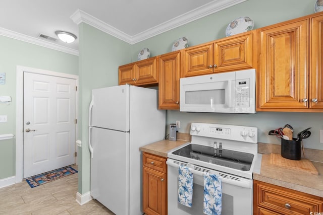 4141 Hibiscus Dr Unit 201, Little River, SC 29566 - kitchen featuring white appliances, crown molding, light countertops, and brown cabinets