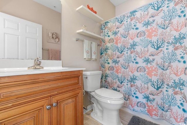 4141 Hibiscus Dr Unit 201, Little River, SC 29566 - full bath featuring toilet, vanity, tile patterned floors, and a shower with shower curtain