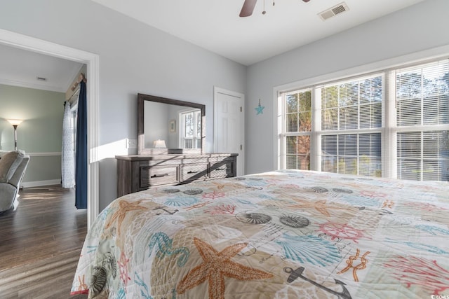 4141 Hibiscus Dr Unit 201, Little River, SC 29566 - bedroom with wood finished floors, baseboards, and a ceiling fan