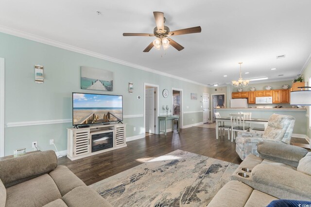 4141 Hibiscus Dr Unit 201, Little River, SC 29566 - living area featuring crown molding, a chandelier, dark wood-style flooring, ceiling fan, and baseboards