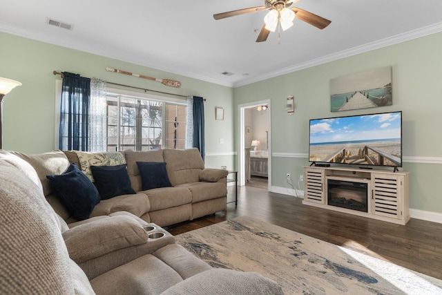 4141 Hibiscus Dr Unit 201, Little River, SC 29566 - living area featuring wood finished floors, ceiling fan, crown molding, and baseboards