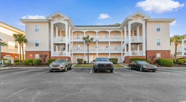 4141 Hibiscus Dr Unit 201, Little River, SC 29566 - view of property featuring uncovered parking