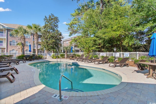 4141 Hibiscus Dr Unit 201, Little River, SC 29566 - community pool with fence and a patio