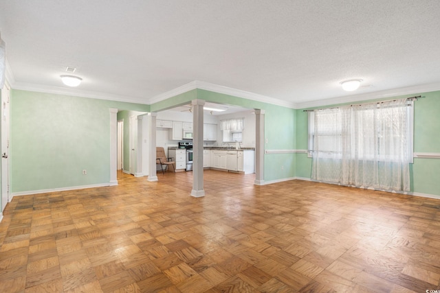 3494 Cactus St Unit 3494, Myrtle Beach, SC 29577 - unfurnished living room with ornate columns, baseboards, healthy amount of natural light, and ornamental molding