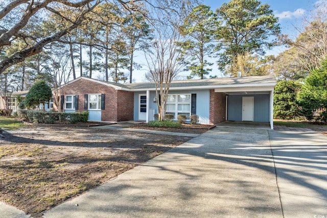 3494 Cactus St Unit 3494, Myrtle Beach, SC 29577 - ranch-style house with brick siding, driveway, and an attached carport