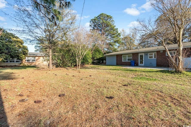 3494 Cactus St Unit 3494, Myrtle Beach, SC 29577 - view of grassy yard featuring a patio