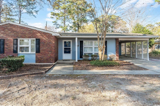 3494 Cactus St Unit 3494, Myrtle Beach, SC 29577 - ranch-style house featuring driveway, brick siding, and a carport
