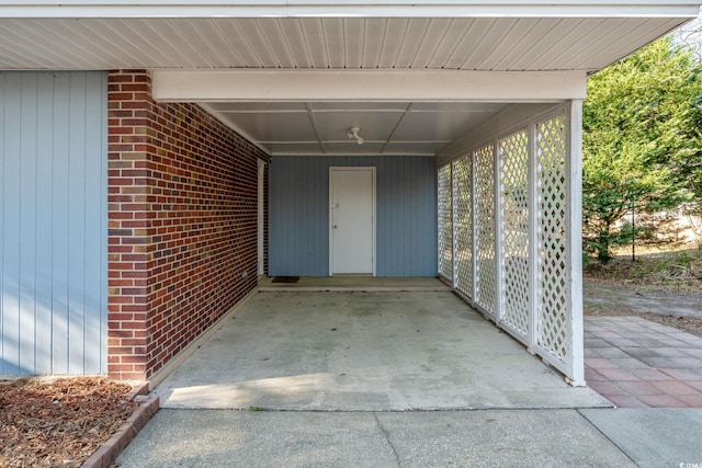 3494 Cactus St Unit 3494, Myrtle Beach, SC 29577 - doorway to property with brick siding and a carport
