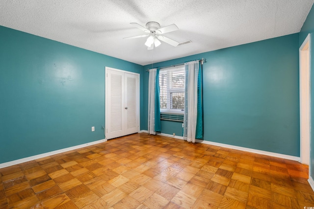 3494 Cactus St Unit 3494, Myrtle Beach, SC 29577 - empty room with a ceiling fan, a textured ceiling, and baseboards