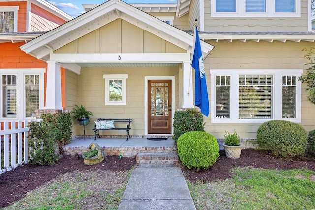 property entrance with covered porch