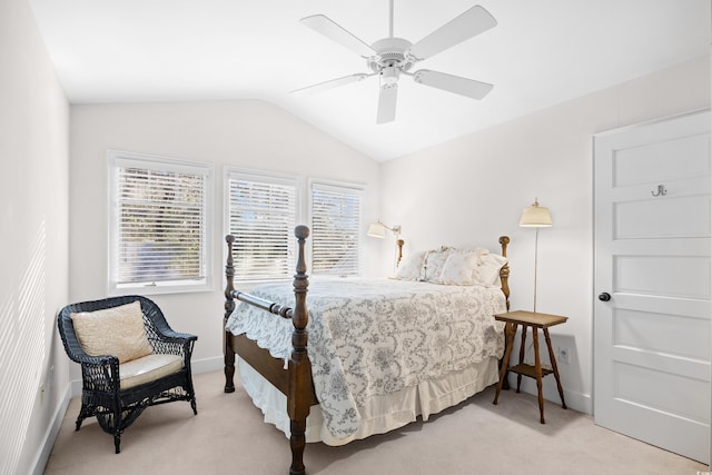 bedroom featuring baseboards, ceiling fan, carpet, and vaulted ceiling