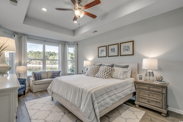 5504 Shelly Lynn Dr, Myrtle Beach, SC 29579 - bedroom featuring a raised ceiling, recessed lighting, visible vents, and light wood finished floors