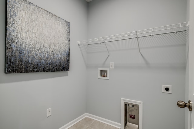 5504 Shelly Lynn Dr, Myrtle Beach, SC 29579 - washroom with laundry area, light tile patterned flooring, baseboards, hookup for a washing machine, and hookup for an electric dryer
