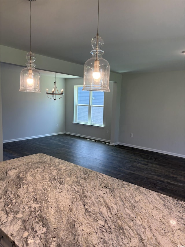 5504 Shelly Lynn Dr, Myrtle Beach, SC 29579 - unfurnished dining area featuring baseboards, a chandelier, and dark wood-type flooring