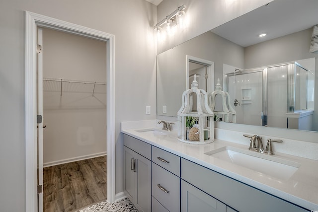 5504 Shelly Lynn Dr, Myrtle Beach, SC 29579 - full bath with double vanity, a walk in closet, a sink, and a stall shower