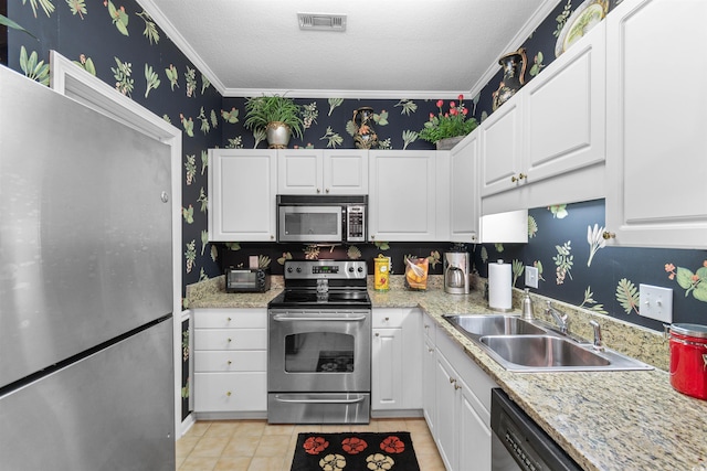 9764 Leyland Dr Unit 9764 5, Myrtle Beach, SC 29572 - kitchen with a sink, wallpapered walls, visible vents, appliances with stainless steel finishes, and ornamental molding