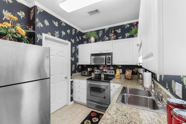 9764 Leyland Dr Unit 9764 5, Myrtle Beach, SC 29572 - kitchen with a sink, wallpapered walls, visible vents, appliances with stainless steel finishes, and ornamental molding