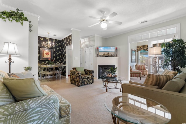 9764 Leyland Dr Unit 9764 5, Myrtle Beach, SC 29572 - living area featuring ornamental molding, a glass covered fireplace, visible vents, ceiling fan with notable chandelier, and carpet floors
