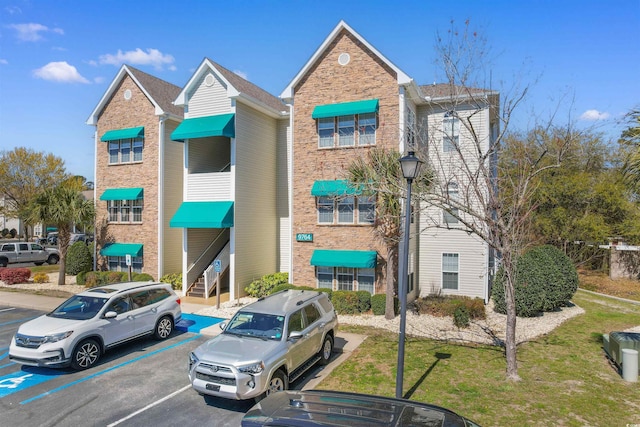 9764 Leyland Dr Unit 9764 5, Myrtle Beach, SC 29572 - view of building exterior featuring uncovered parking