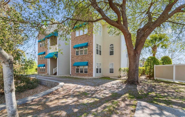 9764 Leyland Dr Unit 9764 5, Myrtle Beach, SC 29572 - view of building exterior featuring fence