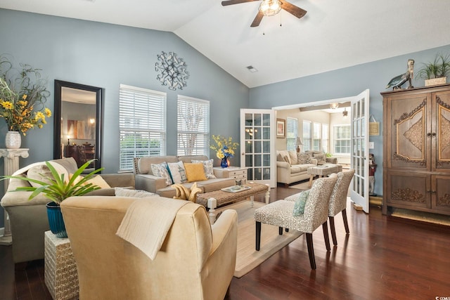 living room featuring visible vents, high vaulted ceiling, a ceiling fan, and dark wood-type flooring
