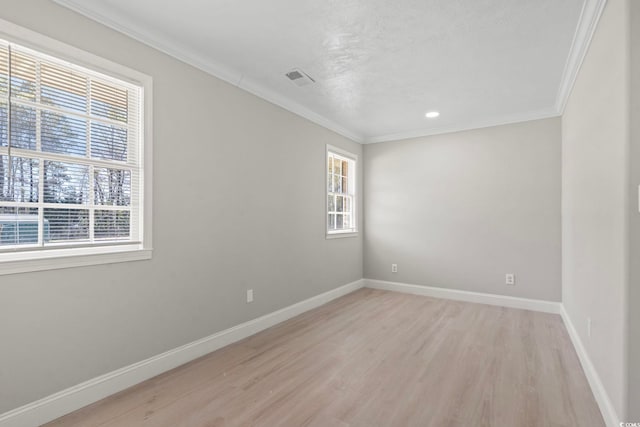1136 Knotty Branch Rd, Conway, SC 29527 - empty room with light wood-style floors, baseboards, a textured ceiling, crown molding, and recessed lighting