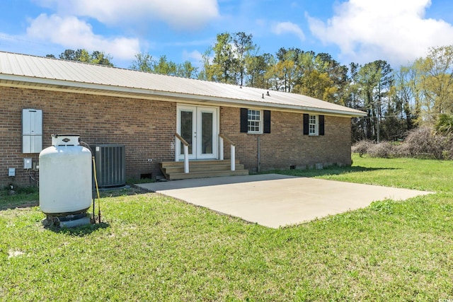 1136 Knotty Branch Rd, Conway, SC 29527 - back of house featuring french doors, crawl space, a patio area, and central air condition unit