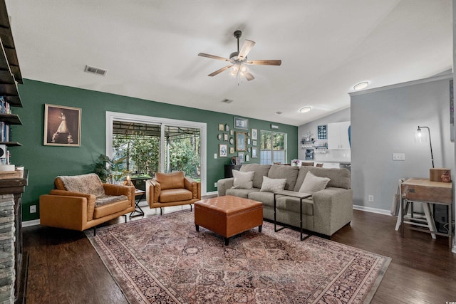 4195 Wrens Xing, Little River, SC 29566 - living room featuring ceiling fan, wood finished floors, vaulted ceiling, and baseboards