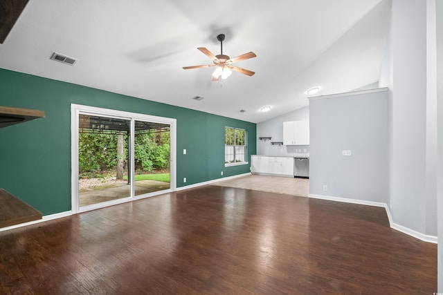 4195 Wrens Xing, Little River, SC 29566 - unfurnished living room with ceiling fan, light wood-type flooring, vaulted ceiling, and baseboards