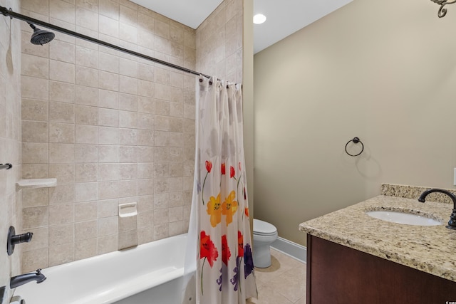 bathroom with tile patterned flooring, shower / bathtub combination with curtain, toilet, vanity, and baseboards