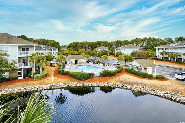 aerial view of residential area with a pool area