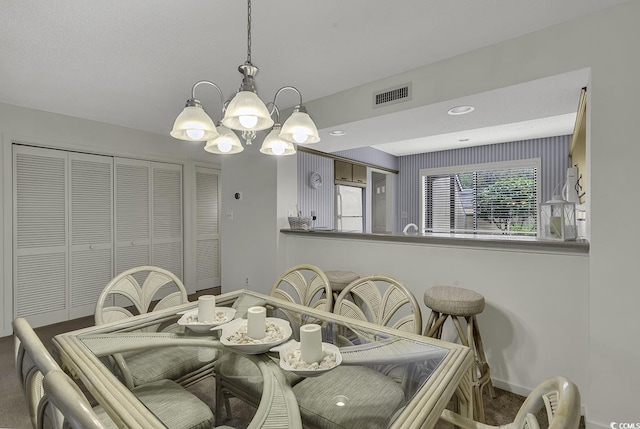 118 Hartland Dr Unit 12-C, Myrtle Beach, SC 29572 - dining space featuring a chandelier and baseboards