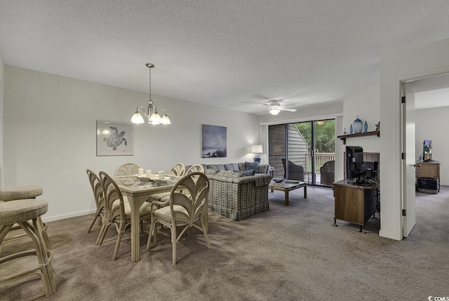 118 Hartland Dr Unit 12-C, Myrtle Beach, SC 29572 - dining space featuring carpet, a textured ceiling, a chandelier, and ceiling fan