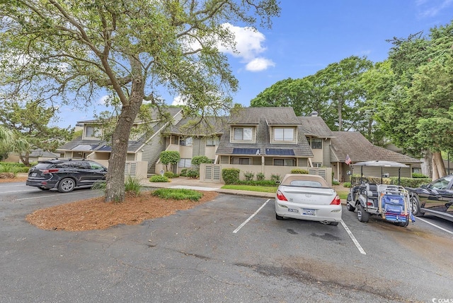 118 Hartland Dr Unit 12-C, Myrtle Beach, SC 29572 - view of front of home featuring uncovered parking and a shingled roof